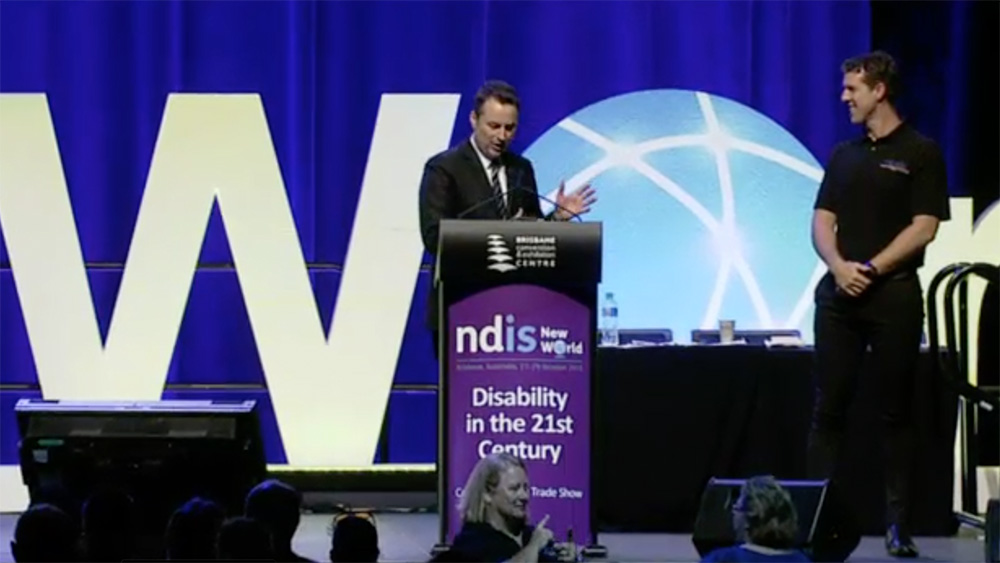Screenshot from the video of Matthew Wright speaking in Auslan at the NDIS New World Conference.